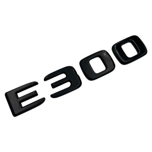Svart Mercedes E300-emblem