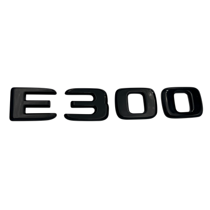 Black Mercedes E300 Emblem