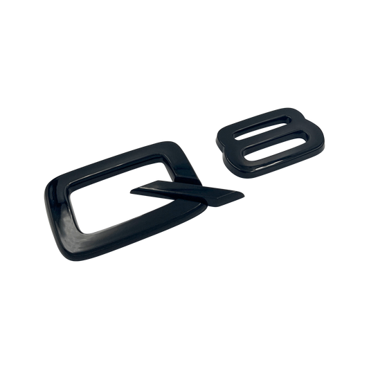 Svart Audi Q8-emblem