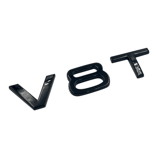 Svart Audi V8T-emblem