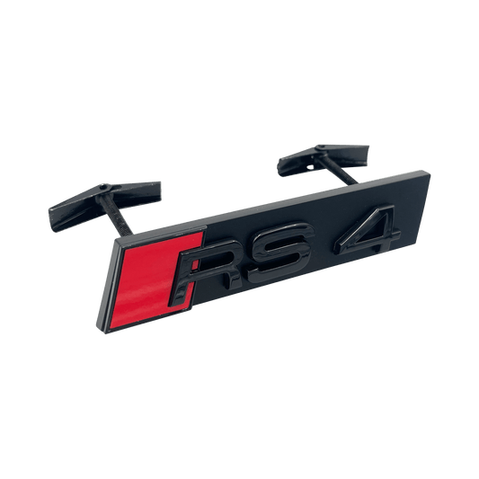 Svart Audi RS4 foran emblem